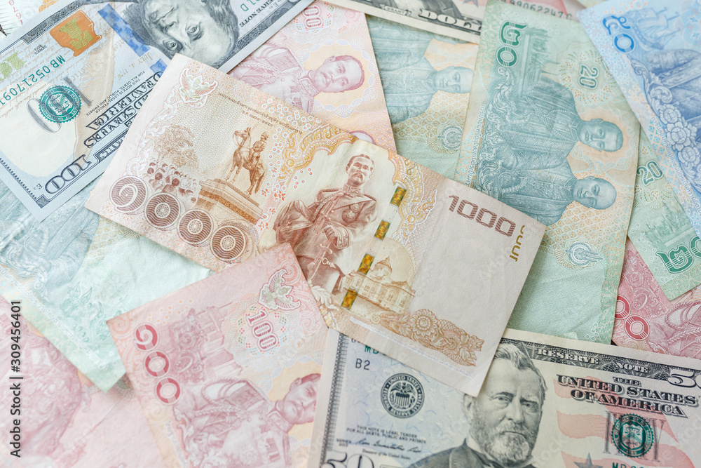 Close up Thai money note and dollars using as background stacking, Business concept Close up Thai money note and dollars using as background stacking, Business concept