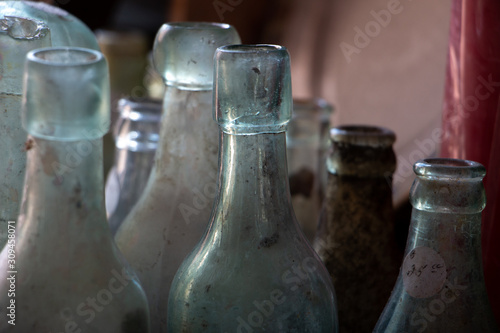 Vintage dusty glass bottles
