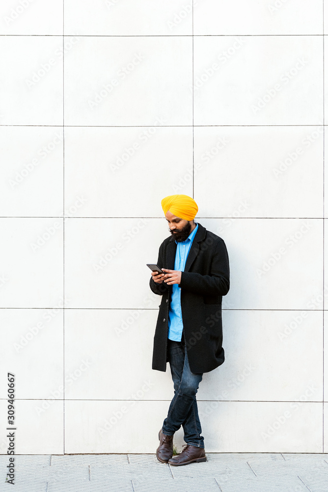 Young handsome Indian Sikh in the street Young handsome Indian Sikh in the street