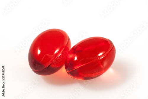 Vitamin capsule isolated on white background
