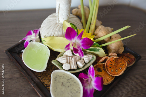 Beautiful composition of spa treatment on wooden table