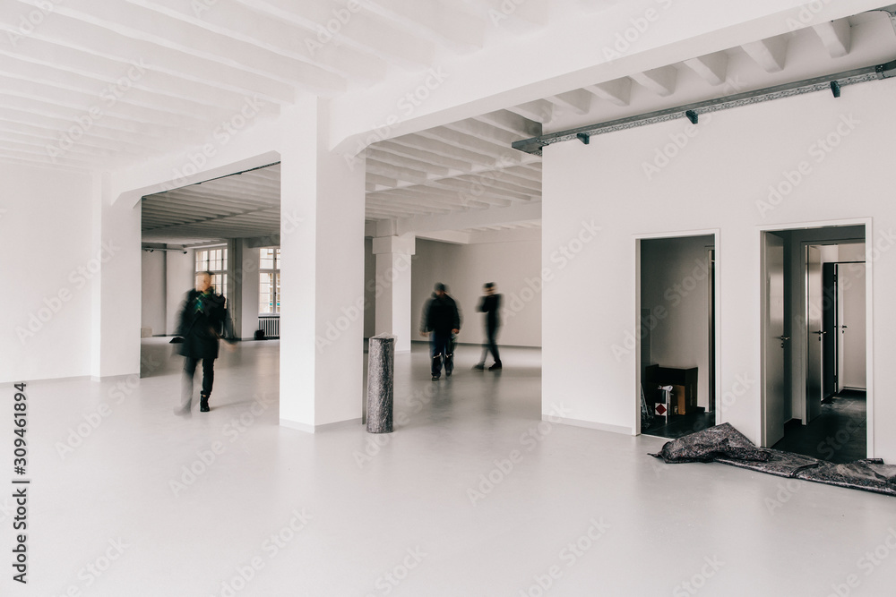 Empty Bright White Industrial Office and Event Space With Blurre Empty Bright White Industrial Office and Event Space With Blurre