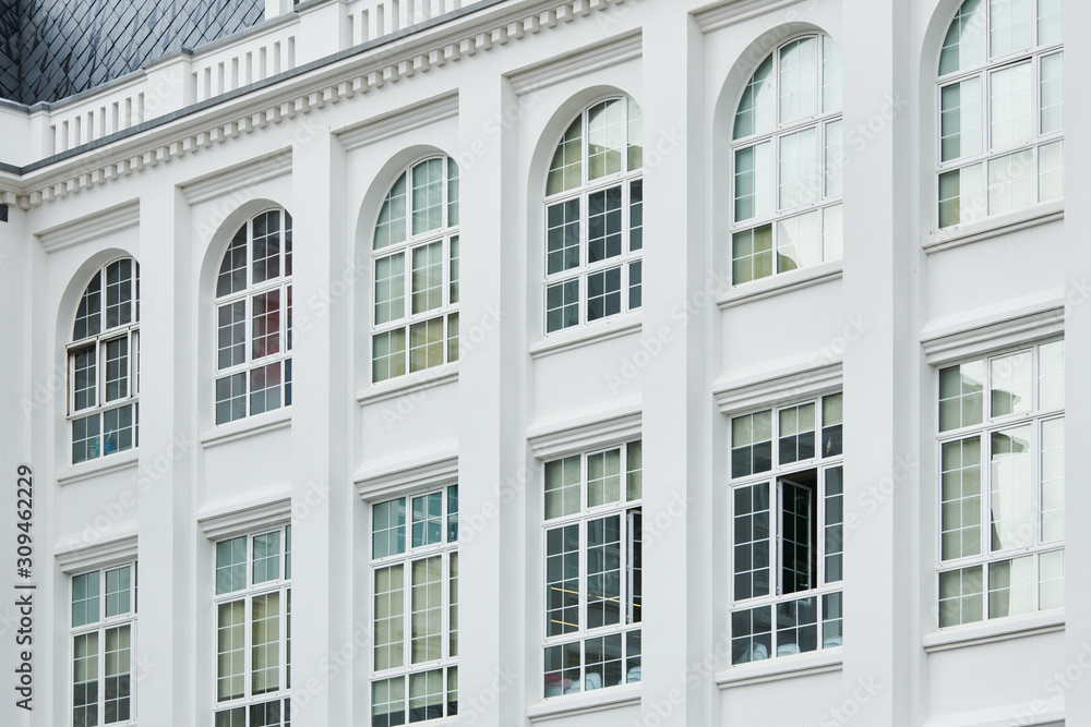 Classic window frames in white building Classic window frames in white building