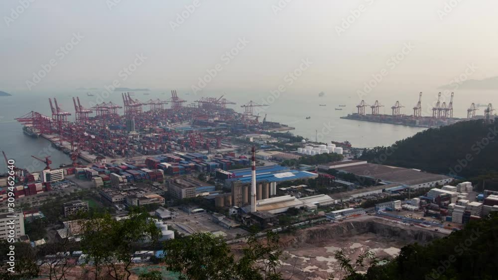 Shenzhen China container port terminal and logistics center timelapse pan up Shenzhen China container port terminal and logistics center timelapse pan up