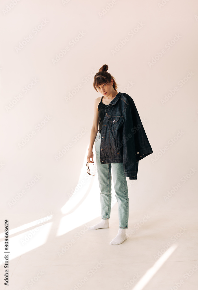 young asian girl on the white background young asian girl on the white background