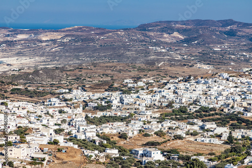 Aerial view with roads, cliffs and houses in Plaka village