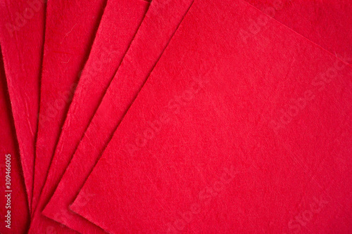 red background, fabric, red felt, design, many sheets of felt