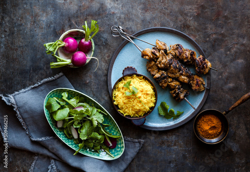 Chicken tikka kebab dish with rice photo