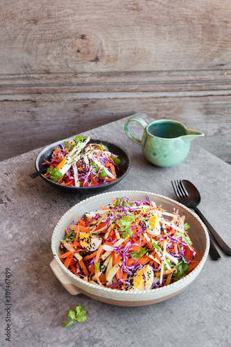 Sesame seed egg carrot apple coleslaw salad