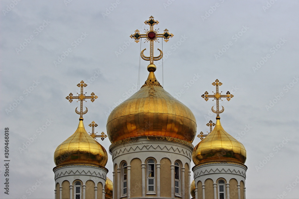 Crosses on Church Golden Domes on gray sky background, Christisnity symbol