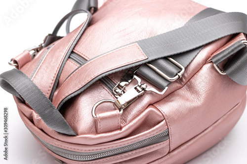 Fashion women leather pink backpack isolated on a white background.