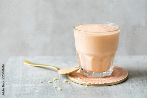 Papaya, coconut and ginger smoothie drink