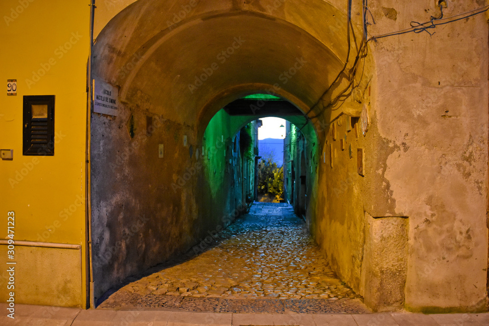 Caiazzo, Italy, 11/12/2019. A narrow street among the old houses of a medieval village