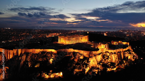 Aerial drone photo of illuminated Acropolis hill and Masterpiece Parthenon with beautiful colours at dusk, Athens, Attica, Greece