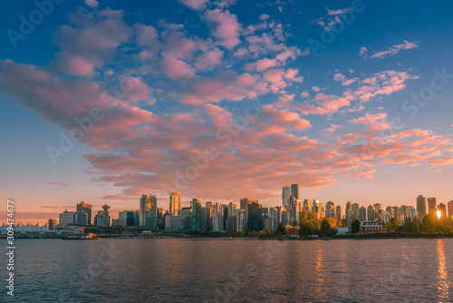 Vancouver city with red sunset clouds © leonw302