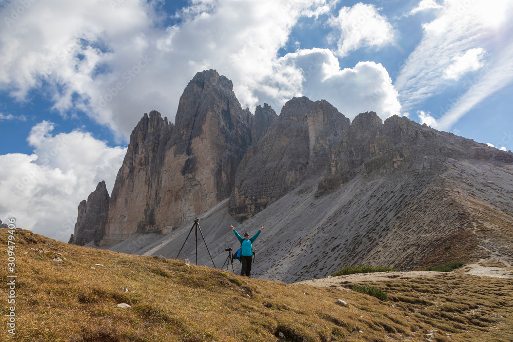 Female photographer on a trek around Tre Cime in the Italian Dolomites