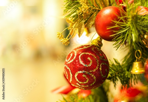 christmas balls and decorations on green background