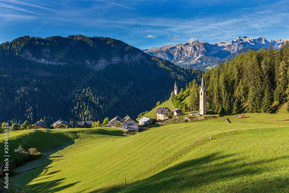 Valley in the Italian Dolomites, South Tyrol region. A view of the beautiful La Valle with its beautiful church.
