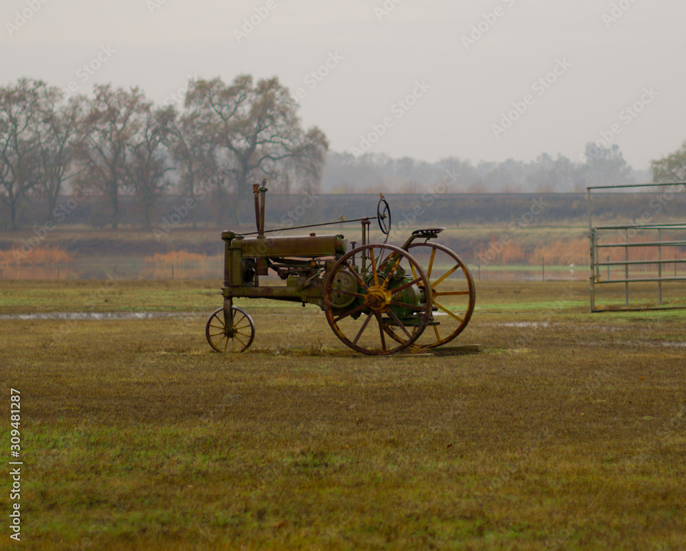 Old tractor in a pasture
