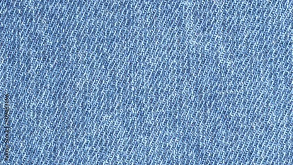 Jeans fabric plain surface background. Denim textile texture tracking. Top view. Slider shot Jeans fabric plain surface background. Denim textile texture tracking. Top view. Slider shot