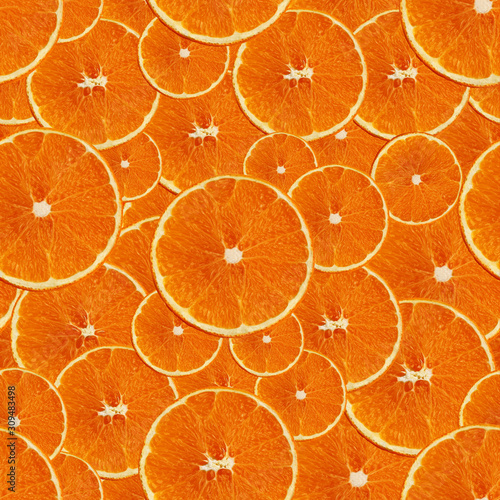 seamless set texture with juicy slices of orange stacked on top of each other for a menu  concept of vegetarian  vitamin and wholesome food  background  pattern for textile  wallpaper  copy space
