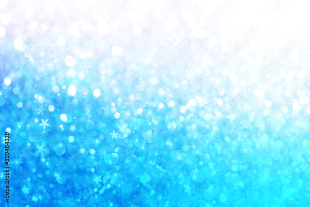 Blurred bokeh light blue pink holographic background, Christmas and New Year holidays abstract texture.