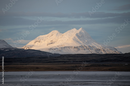 Beautiful rocky mountain covered by snow in Iceland