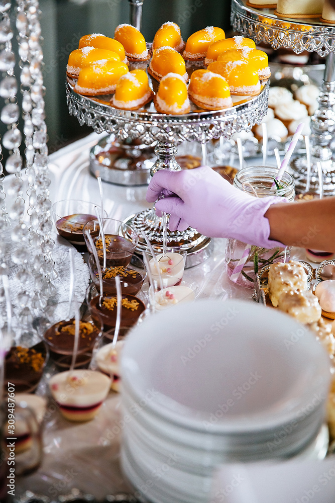 Delicious wedding reception candy bar dessert table