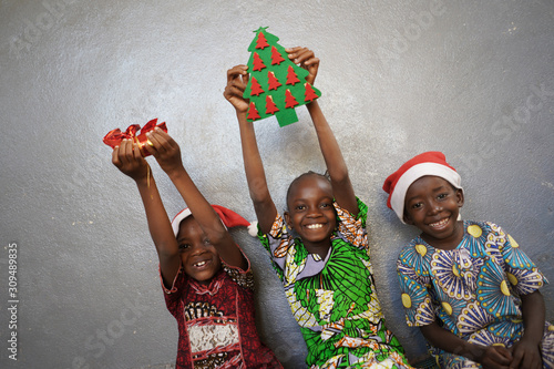Cute African Black Boys and Girls Celebrate Christmas