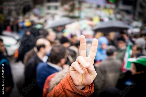 Finger victory symbol on protest