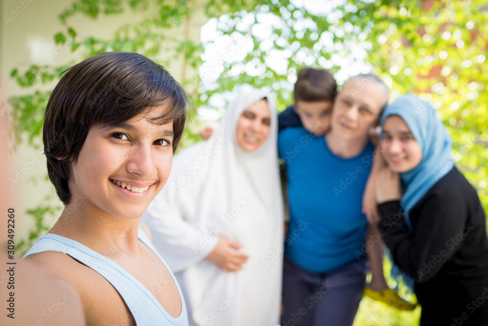 Happy Muslim family selfie portrait
