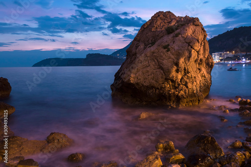 Beautiful sunset on Mediterranean coast. Picturesque bay in Montenegro.