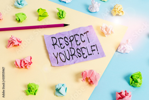 Writing note showing Respect Yourself. Business concept for believing that you good and worthy being treated well Colored crumpled papers empty reminder blue yellow clothespin