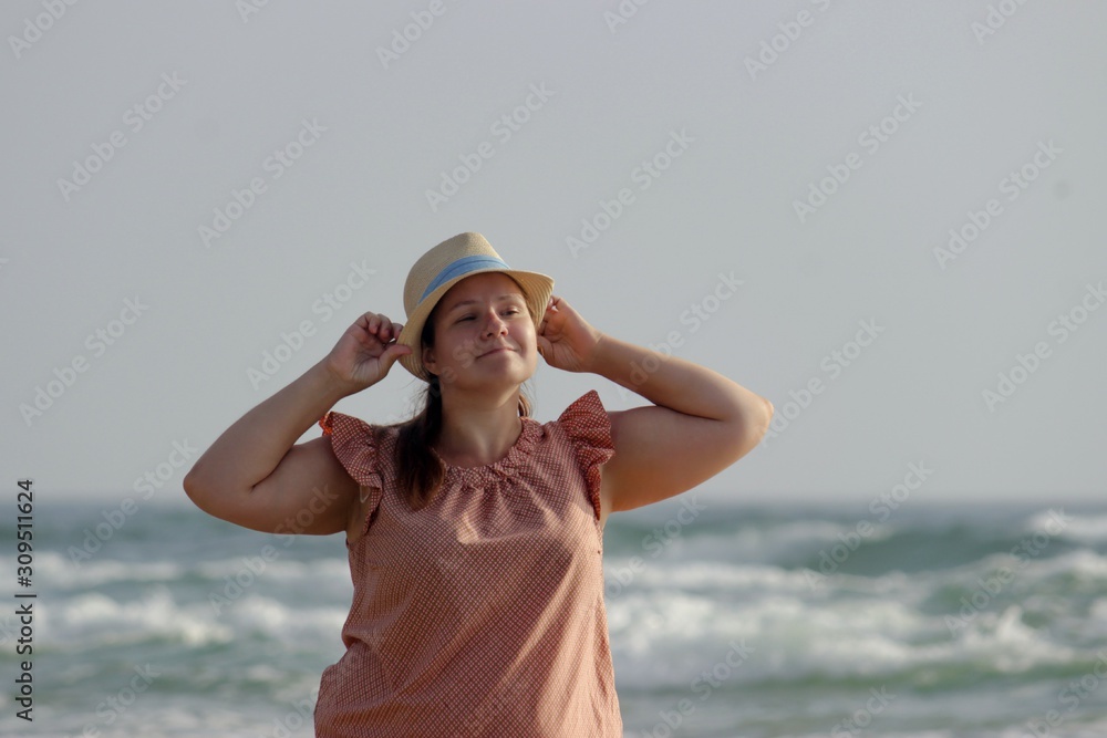 Girl fooling around near the water from a happy vacation. Girl fooling around near the water from a happy vacation.
