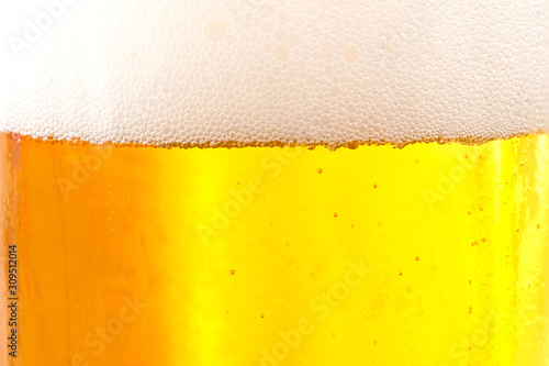 Cool beers with beer bubbles on top a glass at the party or congratulations party or holiday , weekend time , relax time. A man pouring fresh beer. Party Time at Pub and Restaurant Concept.