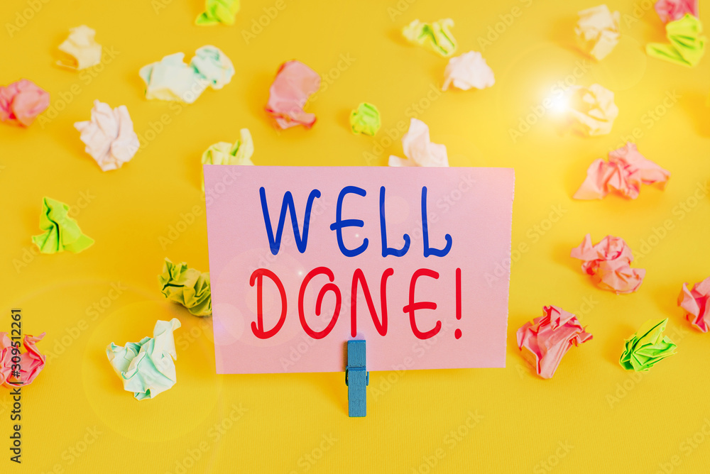 Conceptual hand writing showing Well Done. Concept meaning used praising demonstrating or group for something have done good way Colored crumpled paper empty reminder white floor clothespin Conceptual hand writing showing Well Done. Concept meaning used praising demonstrating or group for something have done good way Colored crumpled paper empty reminder white floor clothespin