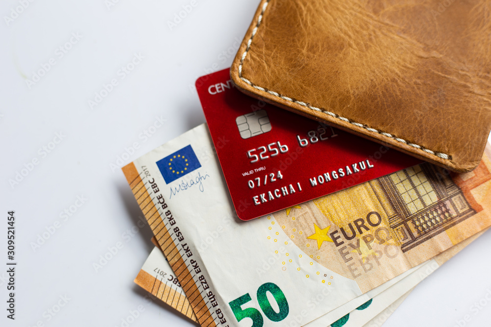 Euro money with credit card on white background Euro money with credit card on white background