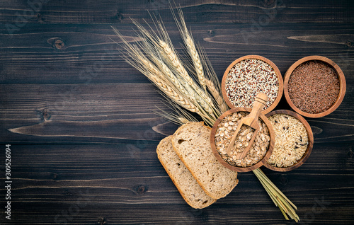 Various natural organic cereal and whole grains seed in wooden bowl for healthy food ingredient product concept.
