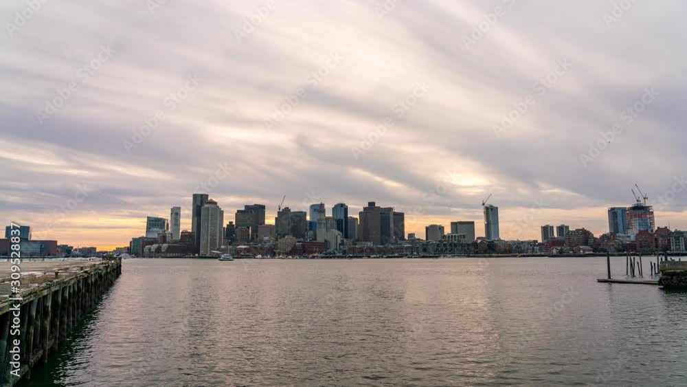 Time Lapse View of Downtown Boston Skyline In Winter Sunset With Clouds Passing By Time Lapse View of Downtown Boston Skyline In Winter Sunset With Clouds Passing By