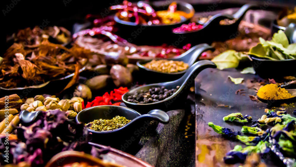 Top view Thai spices and herbs ingredient decoration on wood table for cook in home kitchen. 