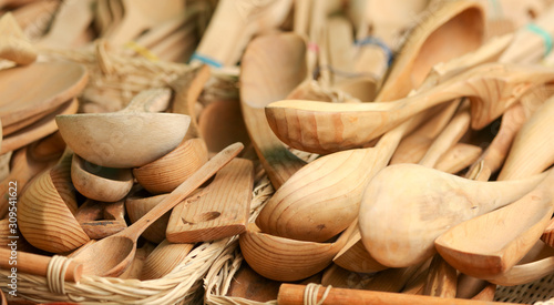 Wooden spoons on the counter in the market