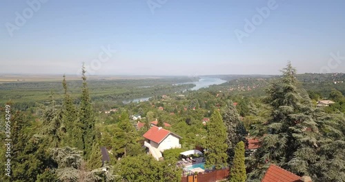 Aerial view of Grocka suburbs in Belgrade and Danube river photo