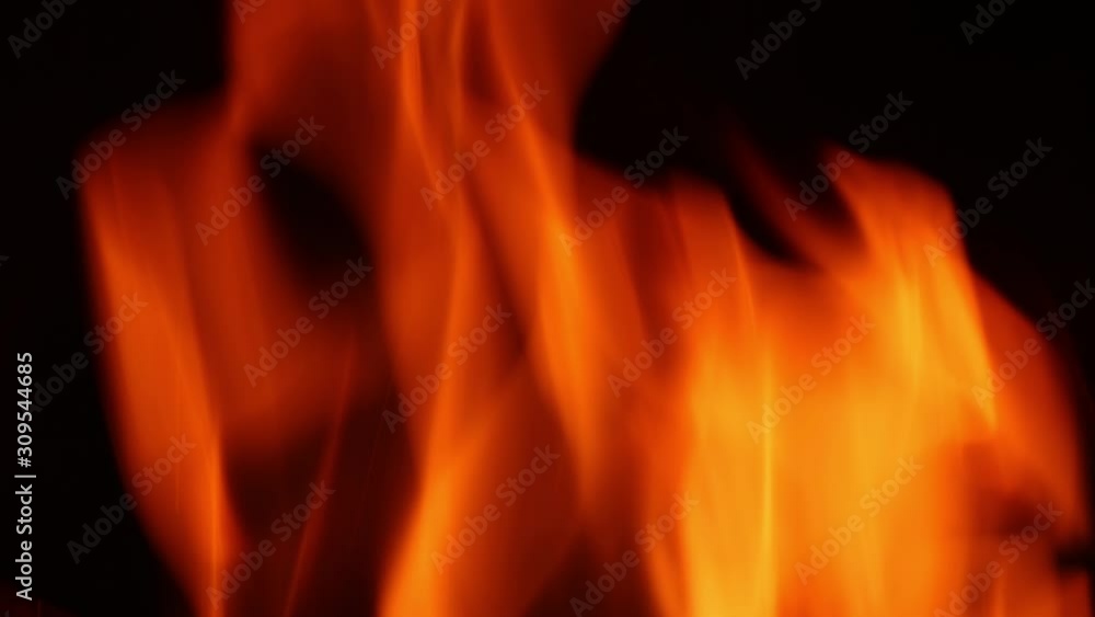Fire inferno with flames of orange, yellow, and red are burning in the night in this seamlessly looping real video footage that could be a fireplace, fire pit, furnace, campfire, etc. Fire inferno with flames of orange, yellow, and red are burning in the night in this seamlessly looping real video footage that could be a fireplace, fire pit, furnace, campfire, etc.