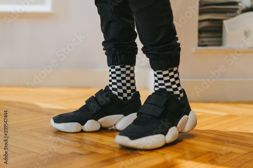 Socks and sneakers of man 