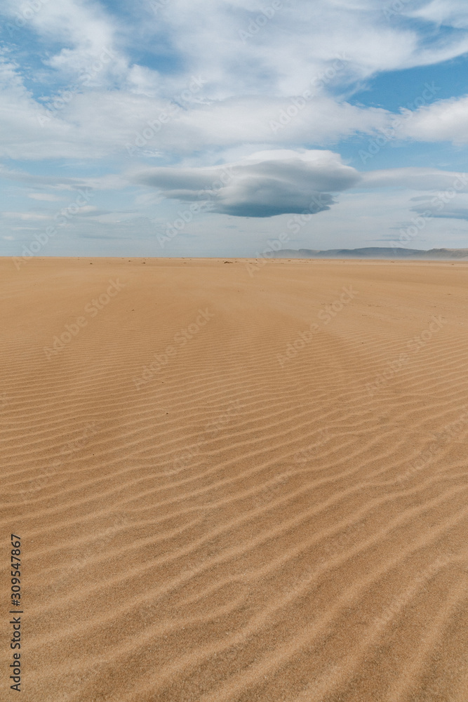Lonely Raudasandur Raudisandur Beach Iceland - sand, clouds, waves