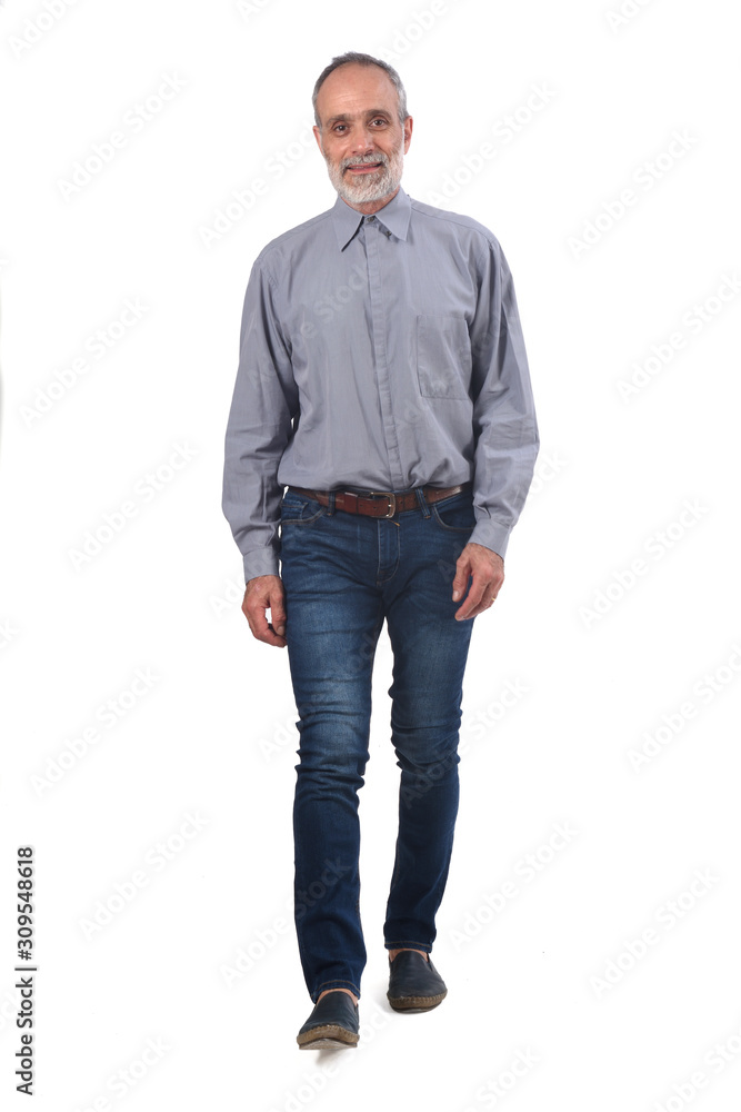 Fototapeta premium middle-aged man with blue jeans and shirt on white background