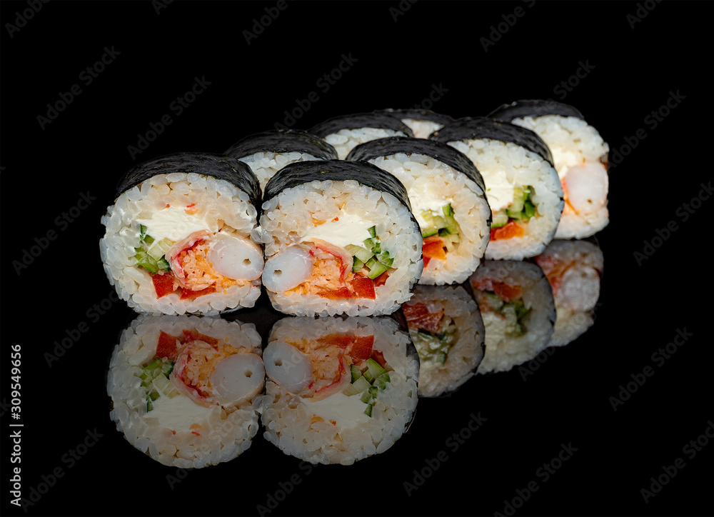 sushi and rolls with different fillings on a black background with reflection sushi and rolls with different fillings on a black background with reflection