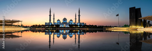 Mosque reflected on the water in Abu Dhabi emirate of UAE