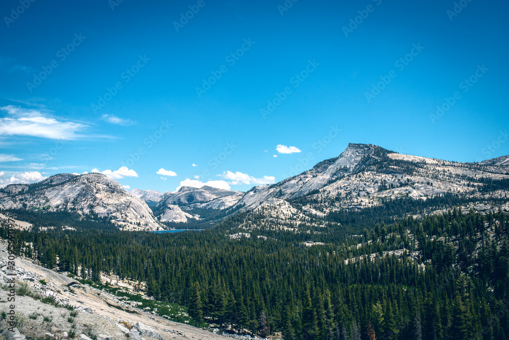 Panoramic view from Glacier Point over Yosemite Valley. Yosemite Valley is a glacial valley in Yosemite National Park in the western Sierra Nevada mountains of Northern California.