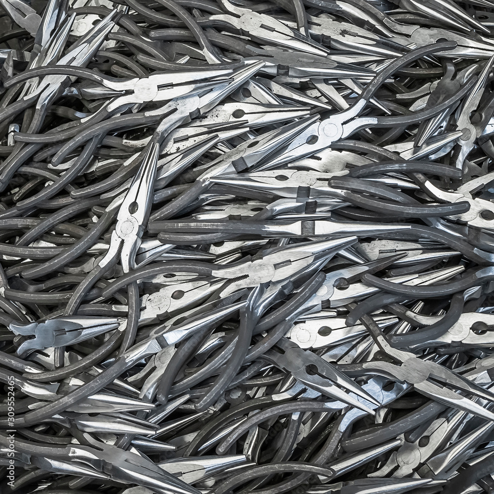 Pattern of pliers. Industrial background of producing tools. Pattern of pliers. Industrial background of producing tools.